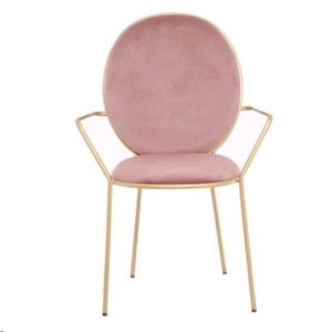 Chaise en velours rose avec accoudoirs